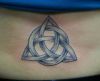 cletic knot tattoo on lower back